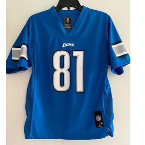 Boys lions jersey, size 14/16. Johnson on the back.